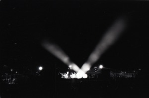 Hollywood Speedway Rock Festival: klieg lights and concert stage at night