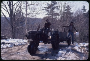 Tony Mathews (driving a tractor) and Al during sugaring, Montague Farm Commune