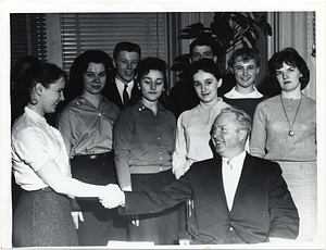 Mayor John F. Collins with unidentified people in his office