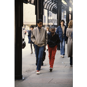 Boys walking together outside