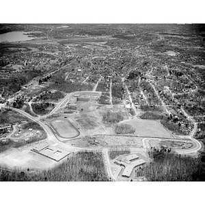 School building complex, including track and football field and residential area, Gerald F. Burke Advertising (client), Reading, MA