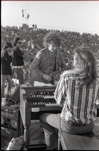 Hollywood Speedway Rock Festival: Elvin Bishop Group in performance: Elvin Bishop playing to keyboardist Steve Miller, Jo Baker in background)