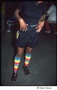 MUSE concert and rally: woman wearing rainbow colored socks backstage at the MUSE concert