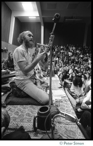 Ram Dass on stage during an appearance at the College of Marin