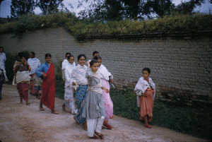 Young women going to a festival