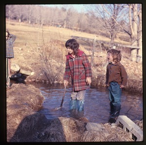 Kids standing in water Montague Farm Commune
