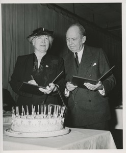 Jeremiah Milbank and woman with cake