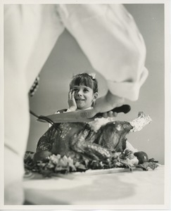 Young client posing with turkey