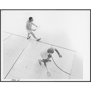Two men in a game of squash