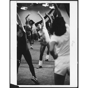 Adults exercising at West Roxbury branch
