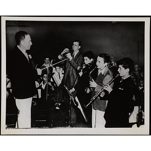 Henry Bernard conducts the Boys' Clubs of Boston orchestra