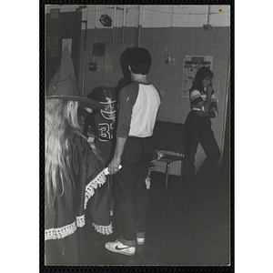 Children in Halloween costumes attend a Halloween party