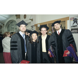 NU law students pose together before graduating