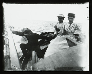 Elinor Curtis and two companions on a sailboat, Manchester, Mass., 1890