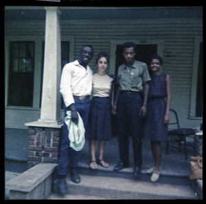 Wayne Yancey, Karin Kunstler, Charles T. Scales, and Barbara Walker (l. to r.) on porch of Freedom House
