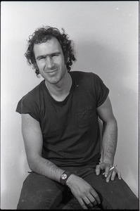 Studio portrait of Richard Safft, seated on a stool