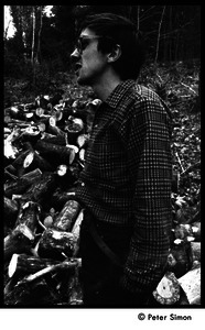 Raymond Mungo, gathering firewood, Packer Corners commune