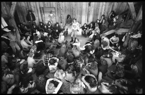 Michael Metelica addressing a crowd of commune members at a meeting inside the Brotherhood of the Spirit dormitory, Warwick, Mass. (view from above)