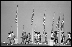 People file past an array of American flags, 25th Anniversary of the March on Washington