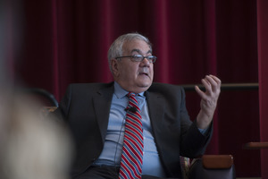 Congressman Barney Frank seated on the Student Union Ballroom stage, UMass Amherst, during his book event