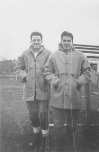 John Brady and unidentified teammate during football practice