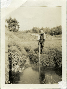 Duxbury Cranberry Company: Jo Smith, resident and employee: poking in a drainage ditch