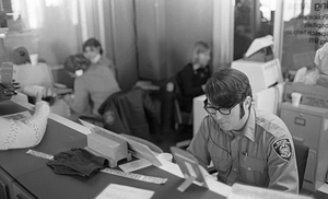 Unidentified Emergency Medical Technician in Boston Police Dispatch Operations Center