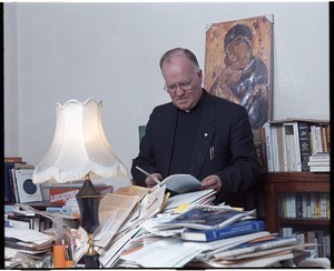 Monsignor Denis Faul, mediator in the Hunger Strike, parish priest in Co. Tyrone. Portraits in his office