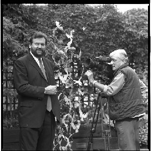 Cyril Cave, legendary press cameraman who shot the historic footage in Derry on Bloody Sunday, with his camera and with Ivan Little, UTV presenter