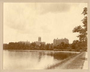 Devlin Hall, Gasson Hall, and Saint Mary's Hall with tree on right, from path around reservoir, by Clifton Church