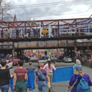 Pride passing under Rail Bridge