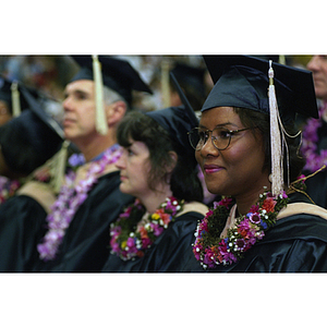 Students wearing leis at commencement