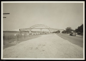 A view of the Sagamore Bridge from a road alongside the Cape Cod Canal