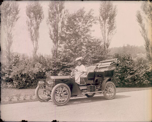Mrs. Lindsey in her automobile