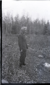 Walter H. Heath, self-proclaimed "Poet of Monadnock": Heath, standing in a field