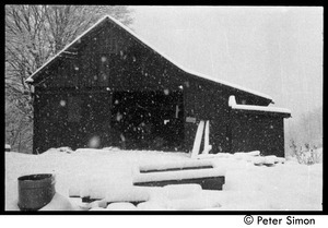 Communal barn in falling snow, Packer Corners commune