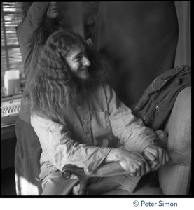 Gangadhar seated on a couch in the Vicente Street house