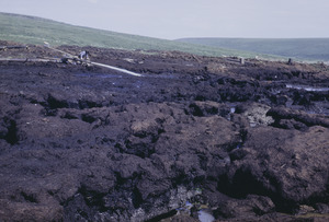 Water blasting cover of tundra so dredge can work