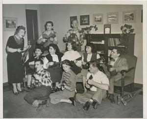 Clients playing ukuleles