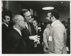 Vice president George Bush talking with an attendee at an ICD conference