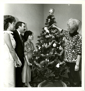 Powercube Corp and Alternative House Inc. Employees with Christmas Tree