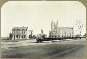 The first four buildings of Boston College's Chestnut Hill campus; St. Mary's Hall, Gasson Hall, Devlin Hall, and Bapst Library, from Commonwealth Avenue