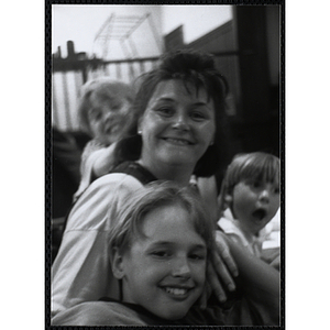 A woman and three boys pose for the camera at a Kiwanis Awards Night