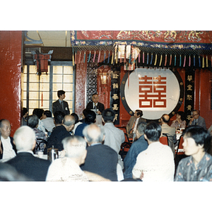 Ambassador Chai Zemin addresses members of the Chinese Progressive Association and others at a restaurant during his first visit to Boston's Chinatown