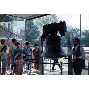 Park ranger addresses a tour group beside the Liberty Bell in Philadelphia