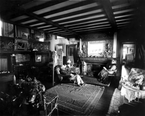 Double portrait of Ernest Wadsworth Longfellow and his wife Harriet Spelman Longfellow, sitting in their parlor, Ernest Longfellow House, Coolidge's Point, Manchester, Mass., undated