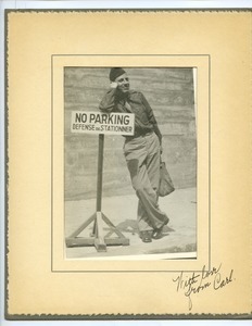 Carl Henry with 'no parking' sign