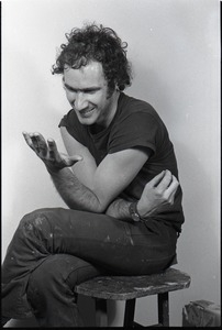 Studio portrait of Richard Safft, seated on a stool