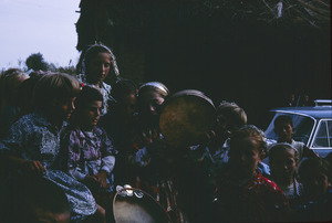 Girls play tambourines