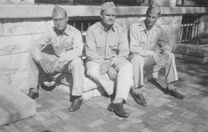 Albert Burgess, Randolph Barrows and Cloyes Gleason sitting outside